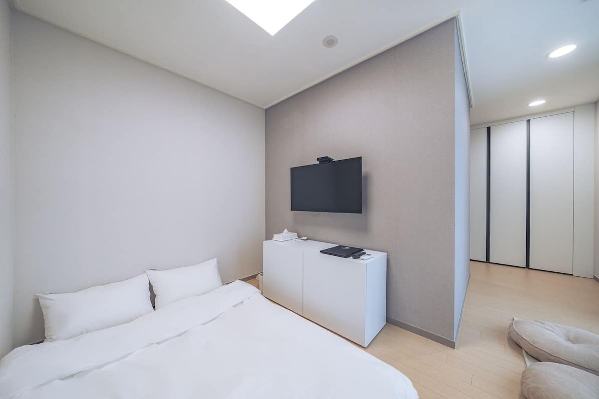 Premium bedding, pillow-top beds, blackout curtains, free WiFi