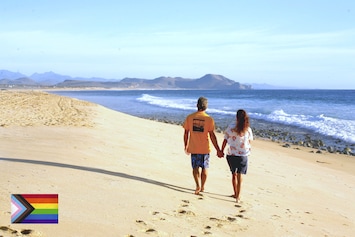 Walking on the beach in front of the property