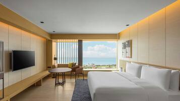 Premium bedding, down comforters, free minibar, in-room safe