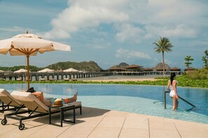 2 outdoor pools, pool umbrellas, pool loungers