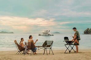 Private beach, sun-loungers, snorkelling