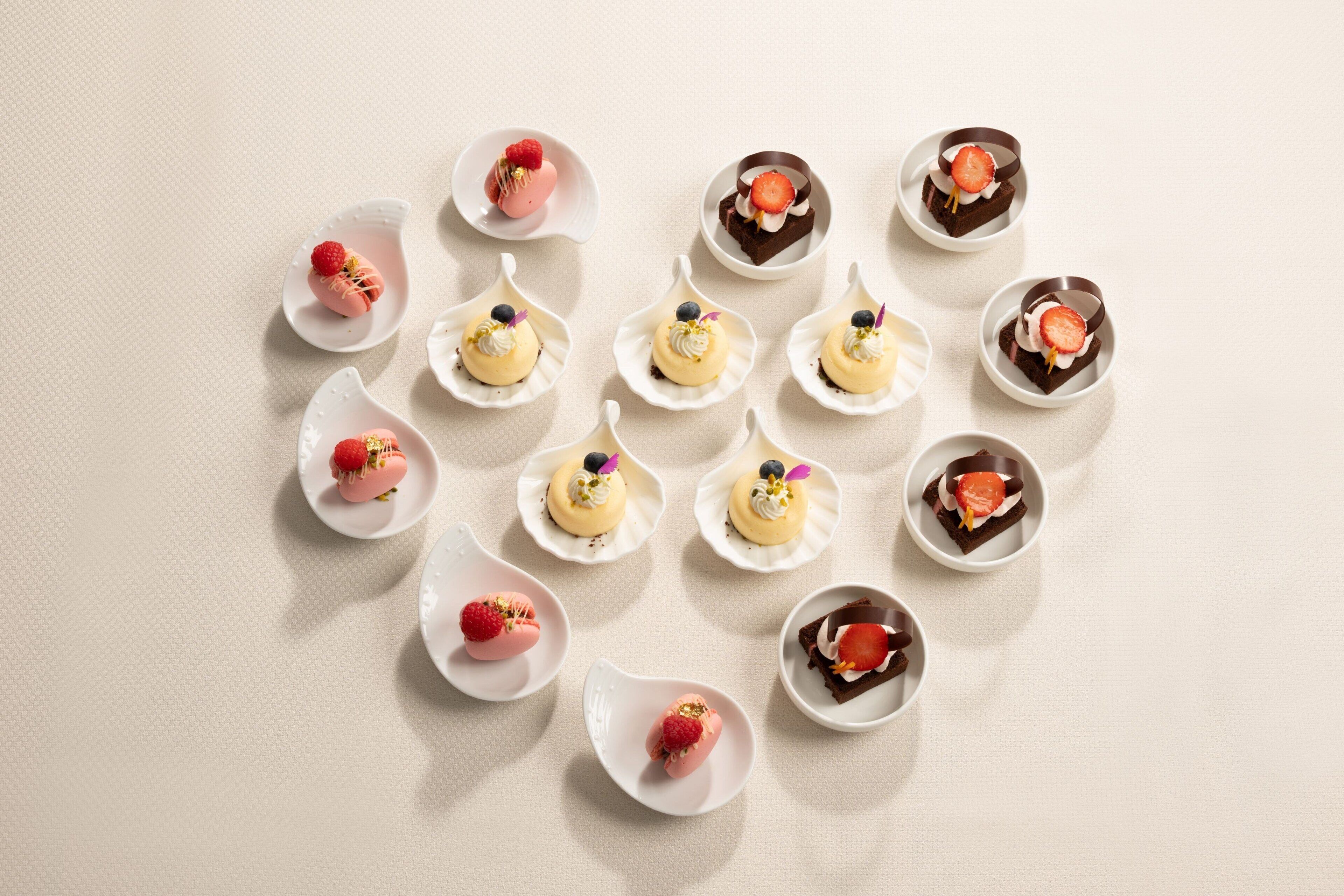 A collection of dessert items arranged on a table.
