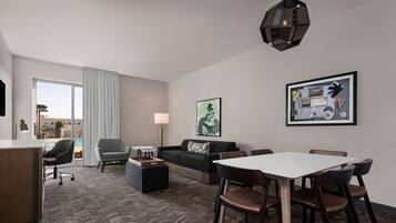 Suite, 1 King Bed, Patio, Poolside | Living area | 43-inch Smart TV with digital channels, Netflix, pay movies