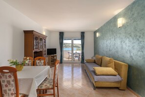 Family Apartment, Multiple Bedrooms, Sea Facing (Family Resort Santa Maria II) | Living area | 21-inch flat-screen TV with satellite channels - Family Resort Santa Maria II Apartment 2 (Novalja)