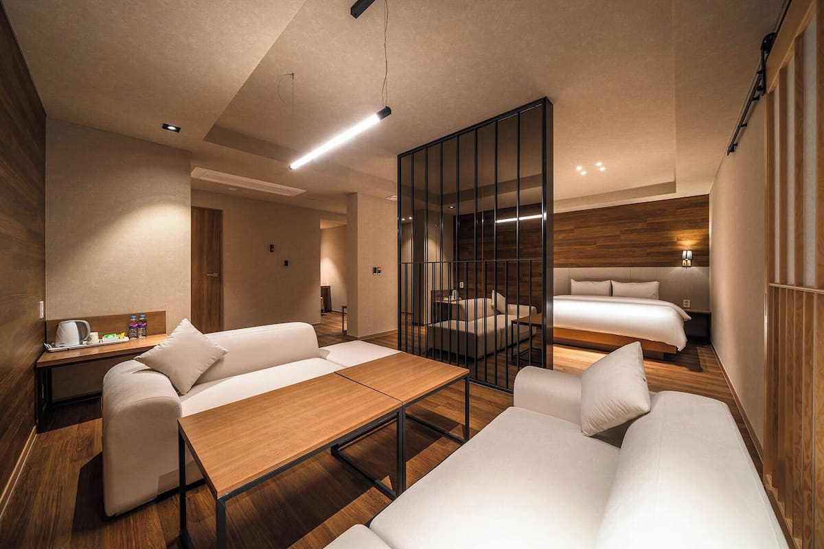 Family Room | Premium bedding, down comforters, memory foam beds, desk