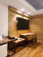 Premium bedding, down duvets, memory-foam beds, desk