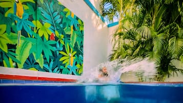 Outdoor pool, open 7:00 AM to 11:00 PM, pool umbrellas, sun loungers