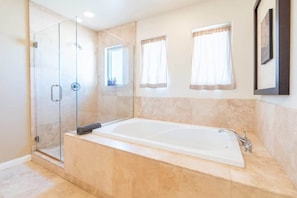 Shower, hair dryer, towels, shampoo