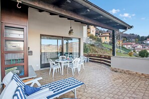 Family House, Multiple Bedrooms, Mountainside (Lake View Terrace Over The Borromean) | Outdoor dining - Lake View Terrace Over The Borromean Isla (Stresa)