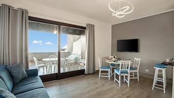 Family House, Multiple Bedrooms, Mountainside (Lake View Terrace Over The Borromean) | Living area | 21-inch flat-screen TV with cable channels