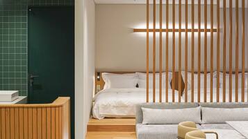 Suite Family | Área de sala de estar | Smart TV, Netflix, películas con cargo y piso con calefacción