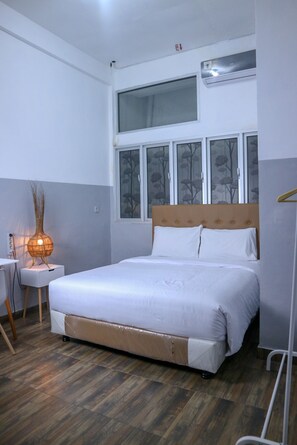 Deluxe Room | Soundproofing, bed sheets - 360Homestay (Padang)