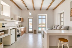 Deluxe Suite, 1 Bedroom | Private kitchen | Espresso maker, coffee/tea maker, dining tables - Lil Paros Luxury suites  (Paros)