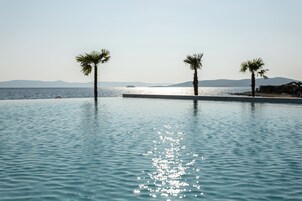 Seasonal outdoor pool, cabanas (surcharge), pool umbrellas