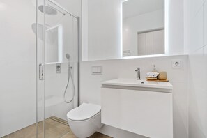 Shower, hair dryer, shampoo