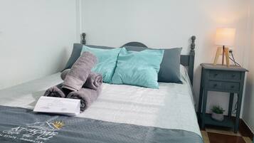 Iron/ironing board, travel crib, free WiFi, bed sheets