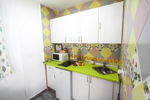 Fridge, microwave, coffee/tea maker, electric kettle