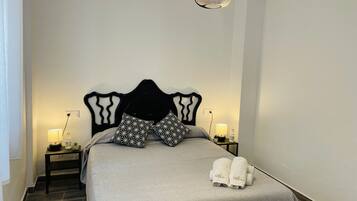 Fer et planche à repasser, Wi-Fi gratuit, draps fournis