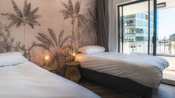 Deluxe Double or Twin Room | Laptop workspace, blackout drapes, iron/ironing board, free WiFi