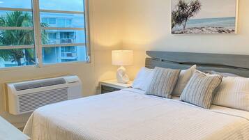 2 habitaciones, tabla de planchar con plancha y cuna de viaje