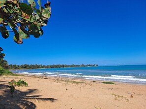 On the beach, sun-loungers, beach towels