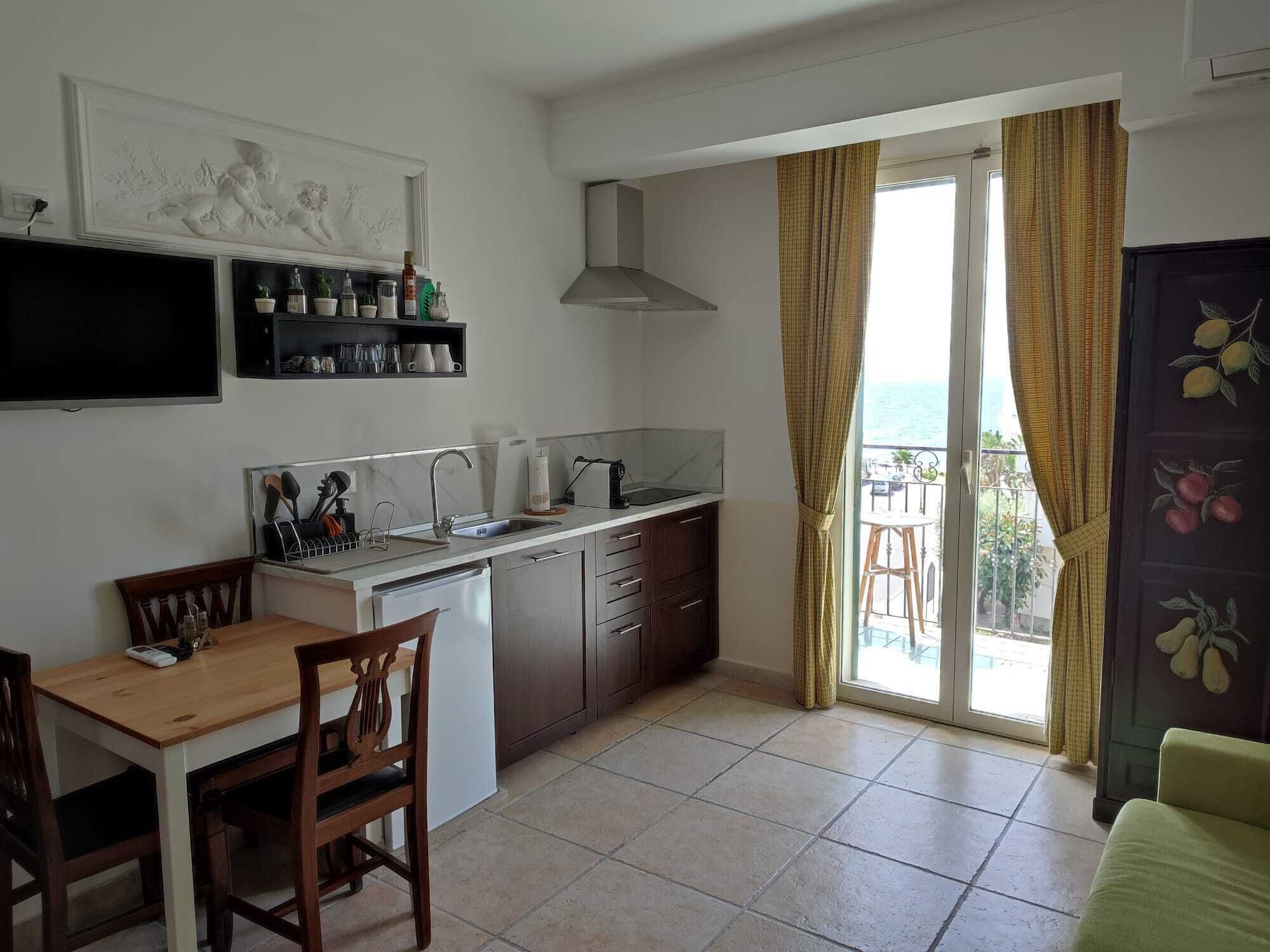 Appartamento Superior, balcone, vista mare | Area soggiorno
