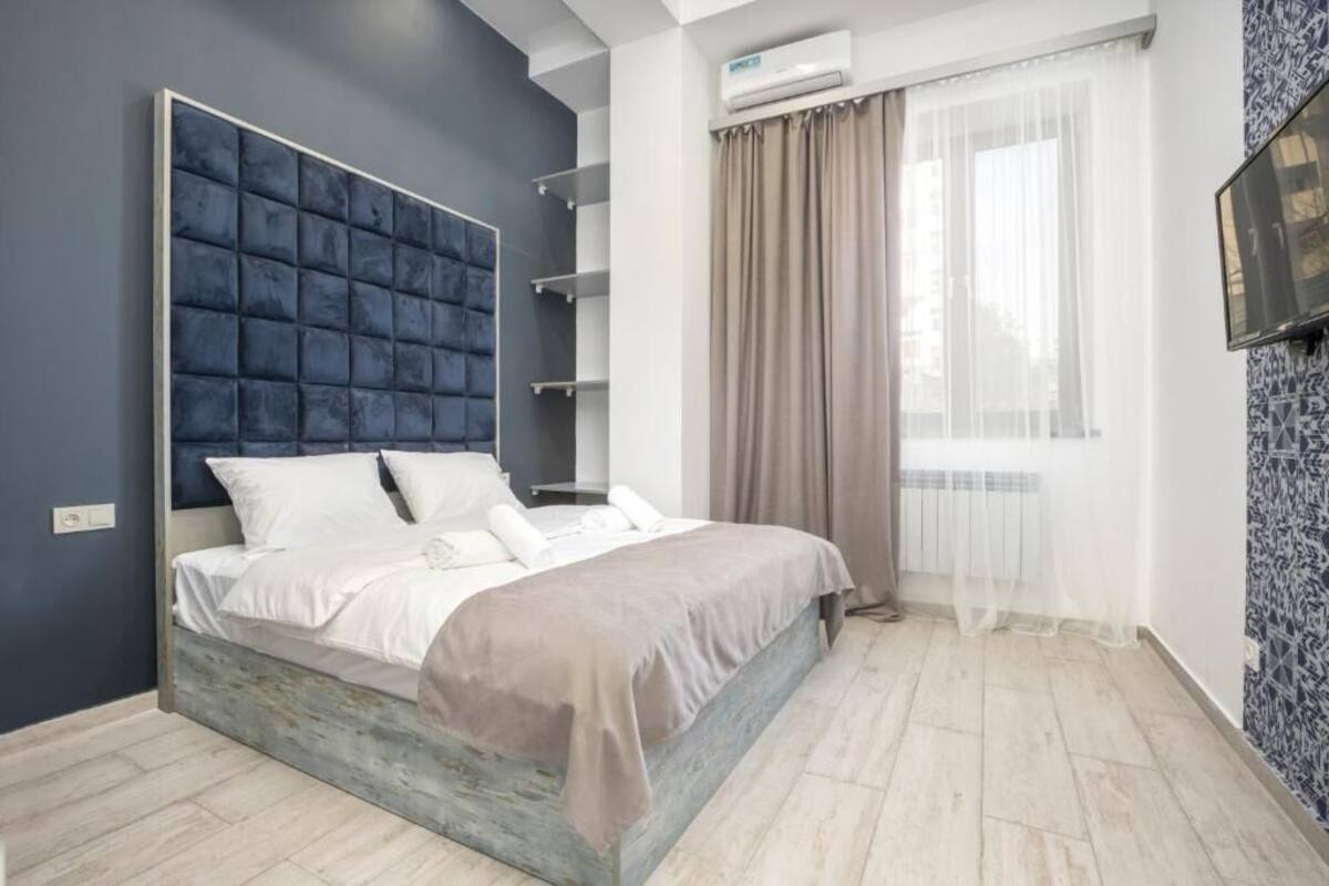 Tweepersoonskamer | 2 slaapkamers, een strijkplank/strijkijzer, gratis wifi, beddengoed