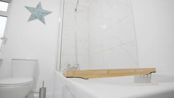 Shower, hair dryer, shampoo