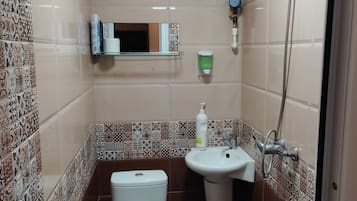 Rainfall showerhead, designer toiletries, hair dryer, bathrobes