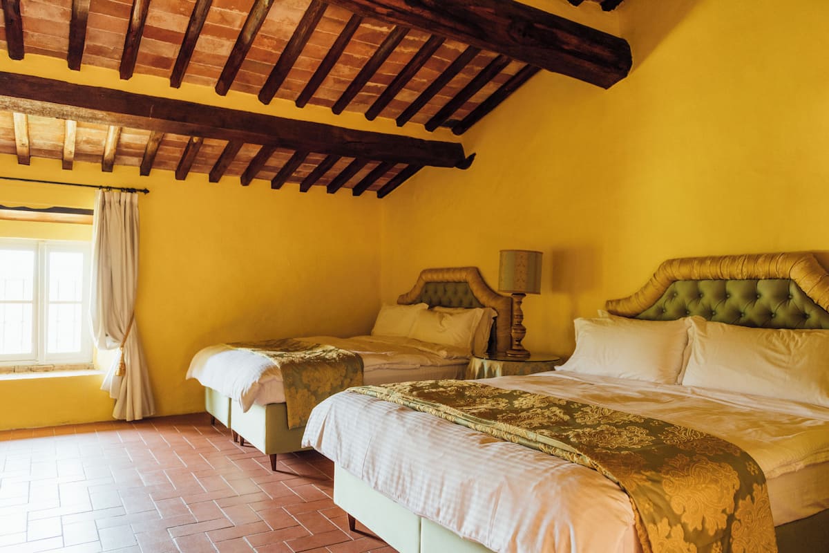 Family Room, Pool View | Premium bedding, down duvets, individually decorated