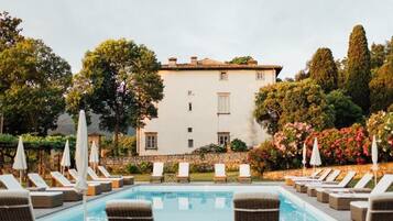 Seasonal outdoor pool, pool umbrellas, pool loungers