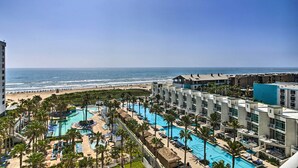 A resort with multiple swimming pools, a beach, and a view of the ocean. - Idyllic South Padre Island Condo: Walk to Beaches! (South Padre Island)