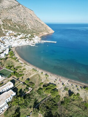 Beach nearby, white sand, beach towels