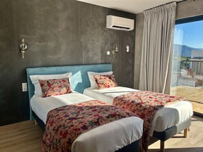 Habitación superior con 1 cama doble o 2 individuales | Ropa de cama de alta calidad y decoración individual