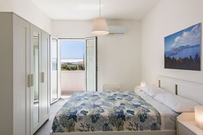 2 quartos, ferros/tábuas de passar roupa, Wi-Fi de cortesia