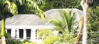 Lucy's Sunny Villa apartments, spacious & modern, your ideal tropical retreat.