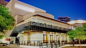 A building with a sign that reads "HEERBERGER." - The Garfield Hideaway| 2BR/2BA | Walk to Downtown (Phoenix)