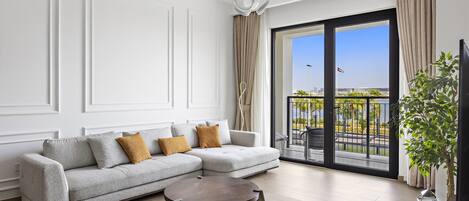 Deluxe Apartment | Living area | 55-inch Smart TV with cable channels, Netflix, streaming services