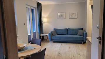Comfort Apartment 6 | Wohnbereich | Flachbildfernseher