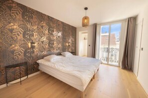 1 habitación, tabla de planchar con plancha, wifi y ropa de cama 