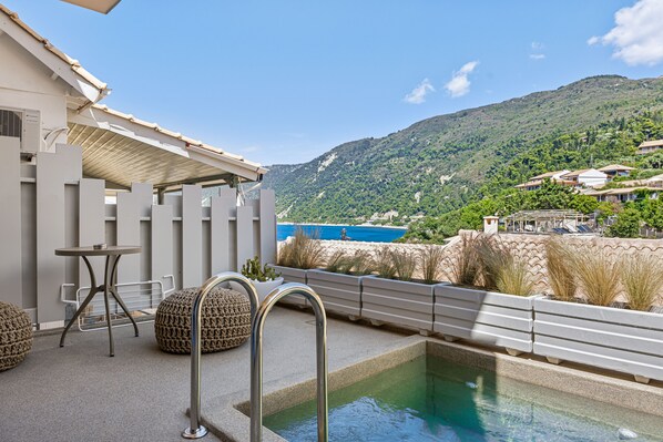 Honeymoon-Suite, eingeschränkter Meerblick | Terrasse/Patio