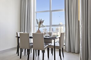 Exclusive Apartment | Dining room - WelHome - Breathtaking Partial Sea View 2BR Close to Marina  (Dubai)