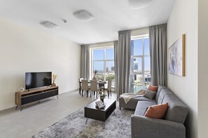 Exclusive Apartment | Living area | Smart TV, Netflix, streaming services - WelHome - Breathtaking Partial Sea View 2BR Close to Marina (Dubai)