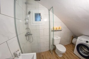 Shower, hair dryer, towels, soap