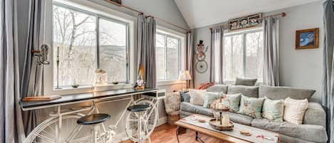 Smart TV, fireplace, table football, books