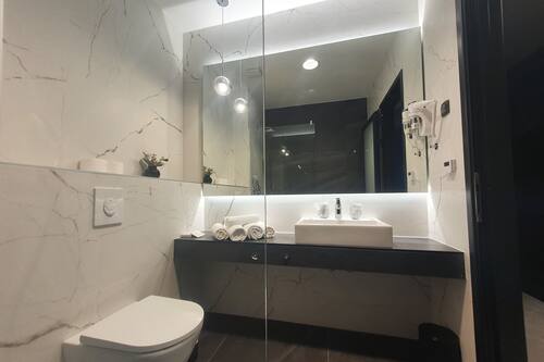 Free toiletries, hair dryer, slippers, heated floors