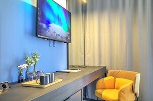 Premium bedding, down comforters, memory foam beds, free minibar