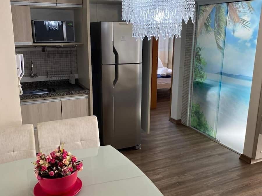 Apartamento | Cozinha privada | Geladeira, micro-ondas, talheres/pratos/utensílios de cozinha