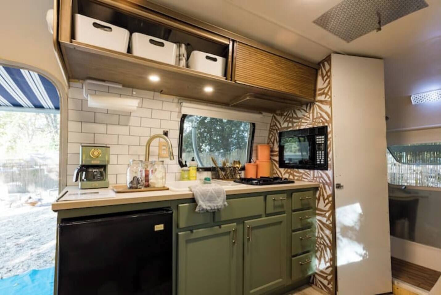 Microwave, stovetop, coffee/tea maker, cookware/dishes/utensils