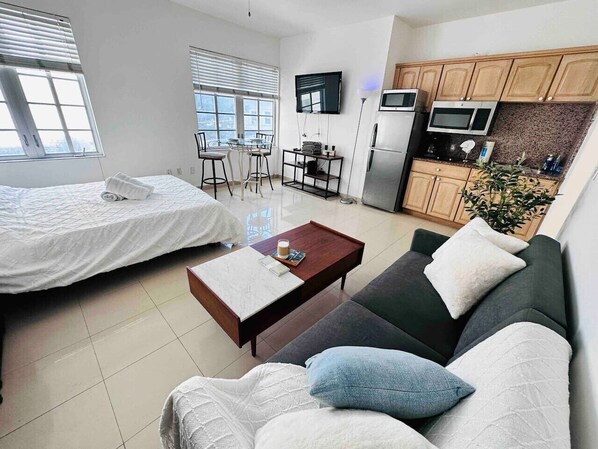 1 bedroom, desk, iron/ironing board, travel cot